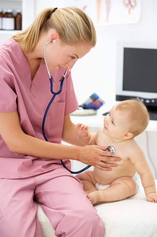 Pediatrician with baby Pediatrician with baby